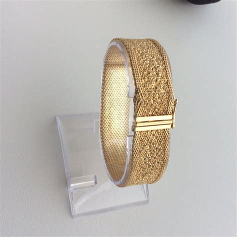 dior armband goud